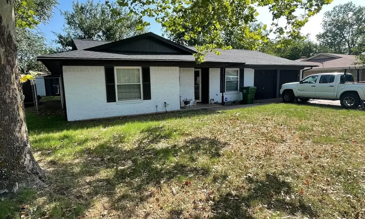 Professional roofing crew working on a residential roof in Hawthorn Woods